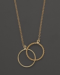 Dazzling interlocking circles of 14K yellow gold.