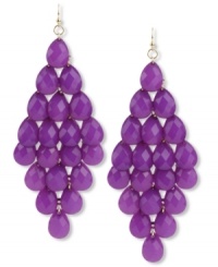 Perfectly pretty in purple. These chandelier earrings from Haskell flaunt a diamond design with clusters of purple acrylic beads in faceted teardrop shapes. Crafted in gold tone mixed metal. Approximate drop: 3-3/4 inches.