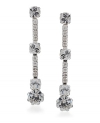 Give your image a little extra twinkle. These dramatic drop earrings by Carolee feature four large, round-cut crystals with eight round-cut crystal accents. Crafted in silver-plated mixed metal with surgical steel posts. Approximate drop: 1-1/2 inches.