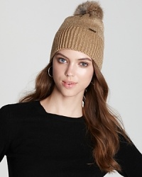 Shine on in MICHAEL Michael Kors' rabbit pom hat with glints of gold or silver, and a front logo plate.