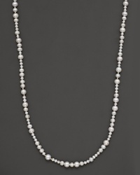 Mixed-size fresh water pearl necklace with 14 Kt. gold bead accents.