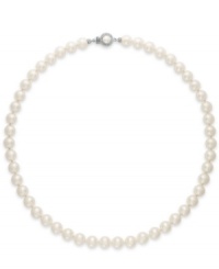 Elegance, simplified. Eliot Danori's darling necklace features shimmering simulation pearls (8 mm) with crystal core and genuine mother-of-pearl coating. Crafted in rhodium-plated mixed metal. Clasp embellished with glass crystal accents. Approximate length: 18 inches.