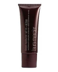 Laura Mercier Tinted Moisturizer - Oil Free is a sheer, lightweight foundation with SPF 20 sun protection for sensitive or acne prone skin. The hydrating, oil-free formula softens skin offering a healthy glow, while preventing excess oil from setting on the surface of the skin. Buildable to hide those hard to cover areas, Tinted Moisturizer - Oil Free is extremely long-wearing, stays colour-true and wears evenly even in humid climates. Mix with your favorite Laura Mercier Foundation to add SPF protection.