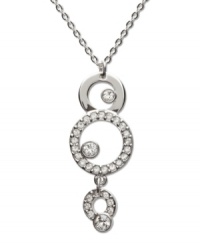 Go around in circles--and out on the town! Get in style with Swarovski's crystal pave circular drop pendant. Setting and chain crafted in silver tone mixed metal. Approximate length: 15 inches. Approximate drop: 1-1/4 inches.