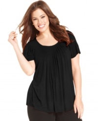 A pleated neckline lends an elegant feel to this ultra-flattering short sleeve plus size top by Style&co.