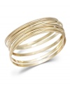 Polished to perfection. Embrace the layering trend in Charter Club's chic bangles. Five piece set is crafted in gold tone mixed metal and features round-cut crystal accents. Item comes packaged in a signature gift box. Approximate diameter: 2-1/2 inches.