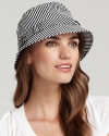 Set out on the town in style wearing a striped bucket rain hat with belted trim.