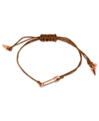 Pin together your new look. This RACHEL Rachel Roy bracelet showcases a safety pin charm with glass stone accents. An adjustable brown waxed cotton cord holds it all together. Set in rose-gold tone mixed metal. Approximate diameter: 3/4 inch. Adjustable from 1 inch to 7-1/4 inches.