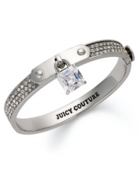 Lock up a new look! This darling Juicy Couture bracelet highlights a skinny padlock with glass stone accent. Bracelet embellished with pave accents. Finished with a box tongue closure. Crafted in silver tone mixed metal. Approximate diameter: 2-3/8 inches.