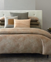 The velvet touch. A velvet block at center squares your bed away in modern Calvin Klein style.