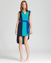 Articulated in supple silk and finished with a dramatic high/low hem, this BCBGMAXAZRIA dress nails the color-block trend to showstopping effect.