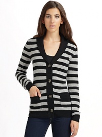 THE LOOKStriped throughoutSolid color shawl collarButton frontLong sleeves with solid, ribbed cuffsDual patch pocketsRibbed hemTHE FITAbout 26 from shoulder to hemTHE MATERIALCashmereCARE & ORIGINDry cleanImported