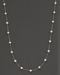 Beaded 14 Kt. white gold necklace with fresh water pearl stations.