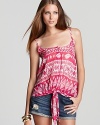 In a bold tribal print, this Aqua tank makes a chic entrance with a knotted front hem.