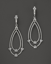 Eloquently shaped, these sterling silver earrings from Judith Ripka are accented with white sapphires.