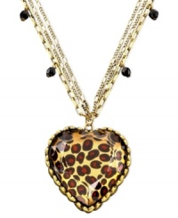 Fall in love with this very cool look from Betsey Johnson. Resin-coated heart-shaped leopard pendant dangles on a layered goldtone metal chain with cute geometric charms throughout. Chain measures 26 inches; drop measures 1-1/2 inches.