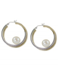 Abstract elegance. Cultured freshwater pearls (7-1/2-8 mm) stand at the center of 14k gold and sterling silver hoop earrings for a bit of postmodern appeal. Approximate diameter: 1-1/4 inches.