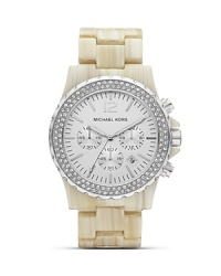 Show your sparkly side with this glitz-bedecked watch from MICHAEL Michael Kors. With a sporty look and sleek design, this piece is a perfect complement to a glamour girl's uniform.