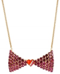 Tie it, you'll love it. This necklace from Betsey Johnson is crafted from gold-tone mixed metal with a bow pendant adorned with fuchsia glass crystal accents and a heart in the center. Approximate length: 16 inches + 3-inch extender. Approximate drop: 2 inches.