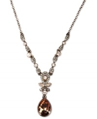 Perfect sparkle for any occasion. This Givenchy Y necklace flaunts rich hues with silk Swarovski stone pendants and accents. Crafted in brown gold tone mixed metal. Approximate length: 16 inches. Approximate drop: 1-3/4 inches.