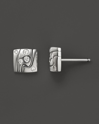 Artfully scattered diamonds embellish these modern 18K white gold stud earrings from Georg Jensen.