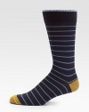 Sophisticated stripes are joined by colorblock detail at the heel and toe for a vibrant contrast.Mid-calf height62% cotton/37% nylon/1% spandexMachine washMade in Italy