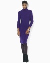 A cozy wool-blend dress is designed in a chic turtleneck silhouette with an A-line skirt for figure-flattering style.