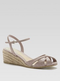 A hemp espadrille wedge elevates this logo-printed leather sandal. Hemp wedge, 1½ (40mm)Adjustable ankle strapLeather upperLeather liningRubber solePadded insoleMade in Italy