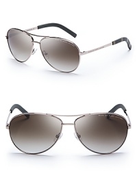 MARC BY MARC JACOBS adds a mod twist to the classic aviator with subtly striped sides.