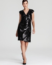 Catch the light of night in a stunning MICHAEL Michael Kors Petites dress shimmering with a dazzling sequin finish. Up the glam factor with high-shine heels.