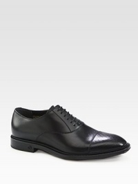 Lace-up shoe in leather with micro diamante trimmed cap toe.Rubber soleMade in Italy