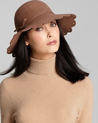 Sweet scalloped detailing and cut-outs along the brim lend this San Diego Hat Company design feminine appeal.