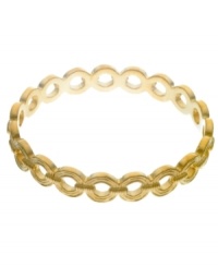 Get glam in goddess-esque style. T Tahari's vintage style bangle bracelet features cut-out circular links in antique gold tone mixed metal. Base metal is nickel-free for sensitive skin. Approximate diameter: 2-1/2 inches.