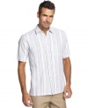 A laid-back style. Relax in this striped linen-blend shirt from Tasso Elba knowing your look is staying fresh.