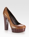 Fierce pump of distressed leather, elevated by a sky-high heel and platform. Painted plastic heel, 5½ (140mm)Painted plastic platform, 1½ (40mm)Compares to a 4 heel (100mm)Leather upperLeather liningLeather and rubber solePadded insoleImported