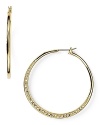 Michael Kors' gold-plated hoops are a versatile daytime detail. Pay attention to the finer points and wear these to add polish to sharp tailoring and sleek suiting.