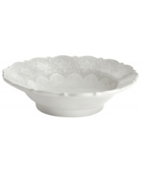 Handcrafted in the Italian tradition, the Merletto serving bowl is intricately embellished with a lacy floral texture and painted a creamy antique white. An elegant companion to Arte Italica dinnerware.