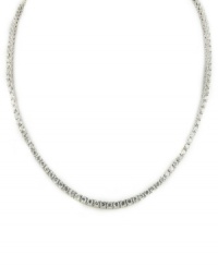 Cultivate style with endless sparkle. This CRISLU tennis necklace features round-cut cubic zirconia (24 ct. t.w.) set in sterling silver with a platinum finish. Approximate length: 16 inches + 2-inch extender.