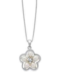 The perfect pick. This pretty flower pendant features cultured freshwater pearls as petals (4-4-1/2 mm) in a smooth sterling silver setting. Approximate length: 18 inches. Approximate drop length: 1 inch. Approximate drop width: 5/8 inch.