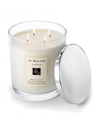 Instantly awakening the senses, Grapefruit is a lively, uplifting citrus with a spicy heart. Grapefruit and tangerine are combined with vetyver and rosemary to create this outspoken citrus scent. With a stunning bouquet lit across four wicks, the Grapefruit Luxury Candle envelops a room and lingers for hours to create an ambiance of warmth, sophistication and style. It is the ultimate luxury. Candle burn time is approximately 230 hours.