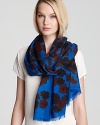 Take the floral trend into cold-weather months with this blue MARC BY MARC JACOBS scarf, printed with brown and dark red flowers.