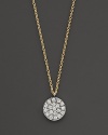 Diamond pavé medallion necklace is set in yellow gold. Designed by Meira T.