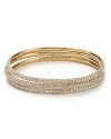 Stack the sparkles with this plated gold ABS by Allen Schwartz bangle set, styled to trace the wrist in delicate crystals.