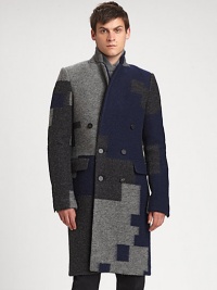 Guaranteed to turn heads, this double-breasted coat made from fine Italian fabric is an undeniable winner.Single-notch lapelButton frontFlap pocketsBack ventAbout 41 from shoulder to hem80% wool/20% polyamideDry cleanImported of Italian fabric