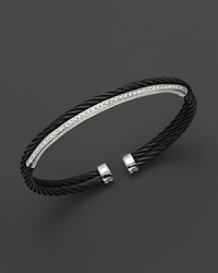 18K white gold and diamonds gleam against jet black PVD on this modern nautical cable bracelet. From Charriol's Celtic Noir collection.