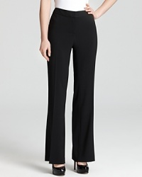 The cornerstone of any working wardrobe, these T Tahari pants combine clean styling with precise tailoring for a flattering silhouette. Pair with polished pumps and command a strong stance.