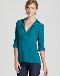 Rendered in luxe silk, this elevated Tegan top updates your wardrobe with sophisticated workday style.