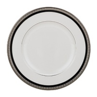 Intricately textured platinum rings on pure white china paired with the fashionably modern look of ebony creates a new sophistication for your table.