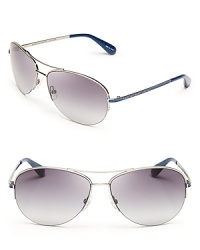 The classic aviator gets a stylish update with colorful arms from MARC BY MARC JACOBS.