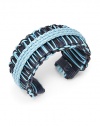 THE LOOKWoven designFaux leather braided detailDyed rope settingTHE MEASUREMENTWidth, about 1.25ORIGINMade in USA